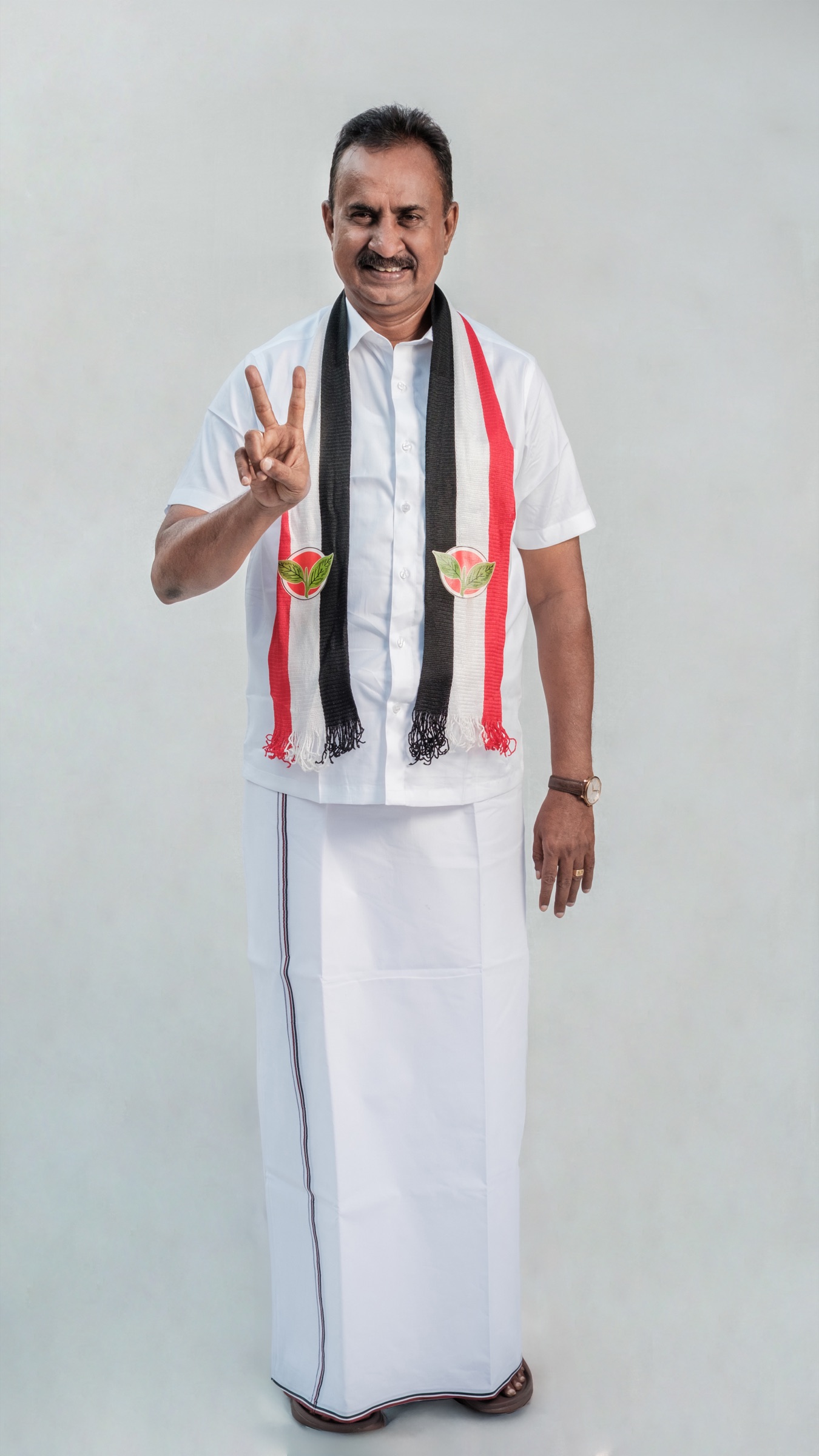 S. P. Velumani standing