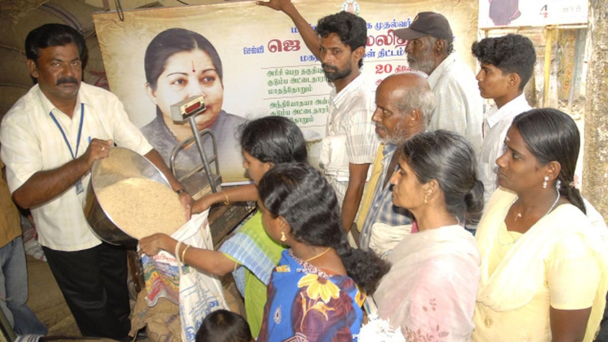 Residents receiving rice at a public distribution counter